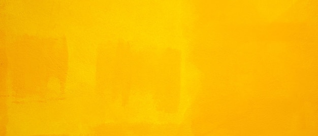 黄色の壁のテクスチャの背景。