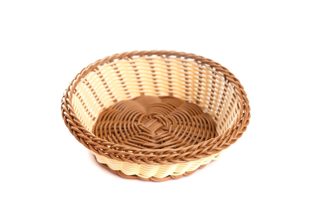 yellow wicker basket on a white background top view