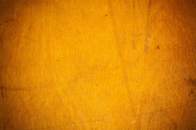 Yellow wooden board background.