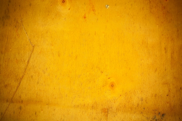 Yellow wooden board background.