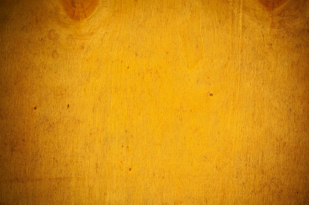 Yellow wooden board background.