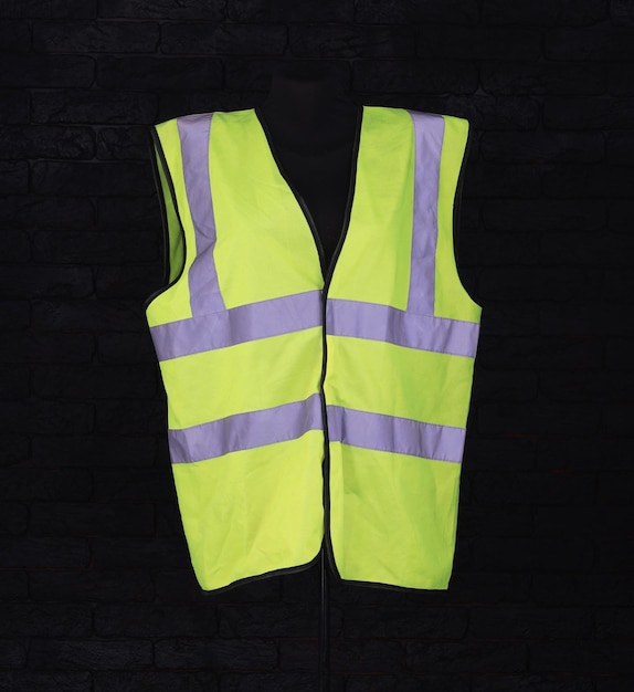 yellow work vest on a mannequin