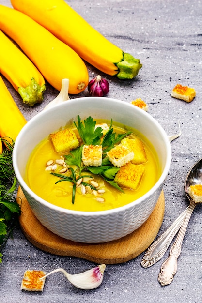 Yellow zucchini cream soup