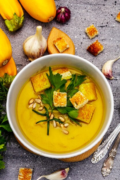 Yellow zucchini cream soup