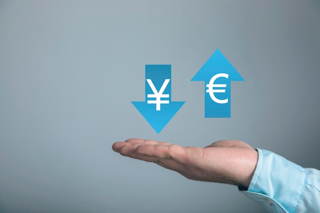 Yen and euro in arrows on a blue background