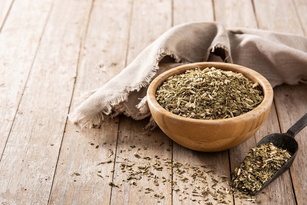 Yerba mate tea on wooden table. Traditional Argentinian beverage