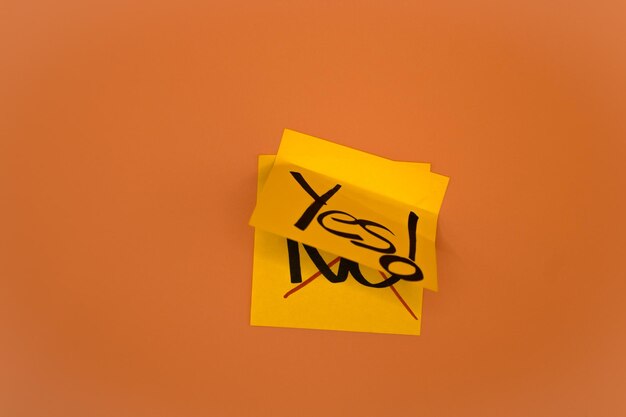yes note over no note yellow notes over orange background