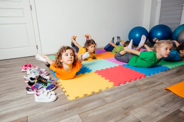 Photo yoga kids classes to strengthen body and soul