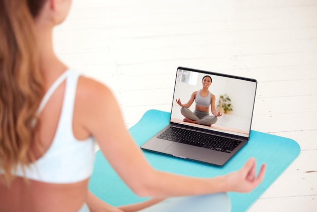 Yoga meditation and wellness woman watching coach teacher or professional health and exercise education video or live stream Girl training and learning how to relax via online classes on a laptop