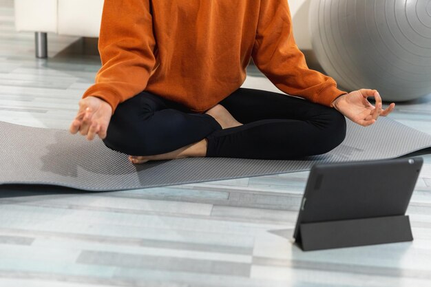 Yoga mindfulness meditation woman hands in chin mudra gesture african girl practicing yoga at home w