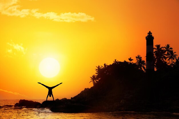 Yoga near lighthouse