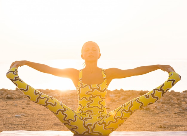 Yoga practice at sunrise