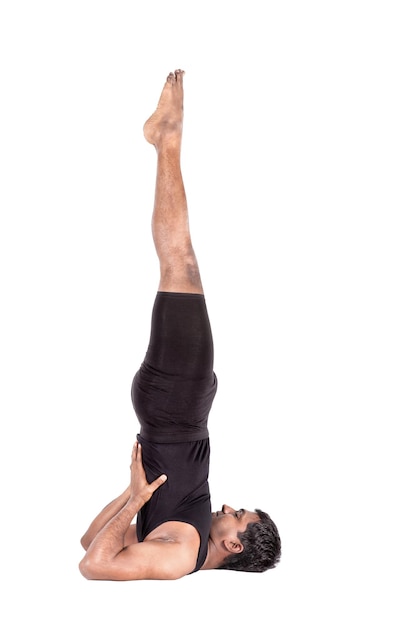 Yoga shoulder stand pose on white