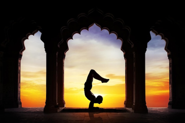 Yoga silhouette in temple