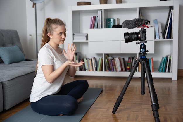 Yoga or stretching instructor creating content for social media