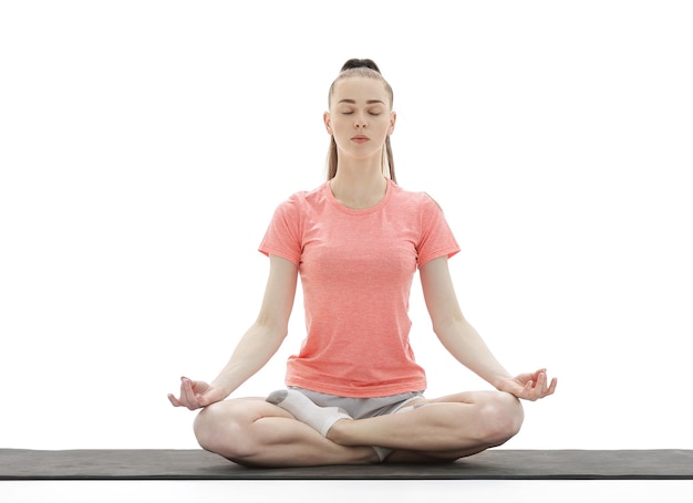 Yoga Woman Meditating and Doing Yoga Against White background