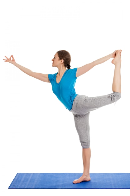 Yoga - young beautiful woman doing yoga asana exercise isolated