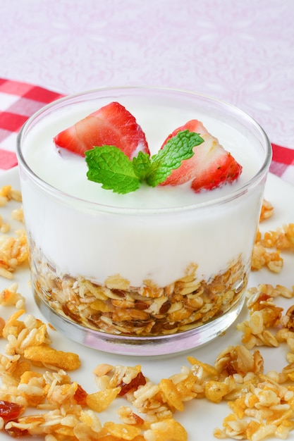 Yogurt with cereals and strawberries