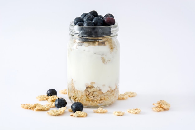 Yogurt with fresh blueberries and cereals 