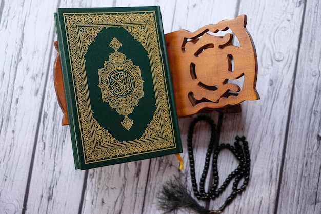 Yogya, Indonesia. May 3, 2022. Al Quran on a wooden stand. Quran or Koran is Islamic holy book.