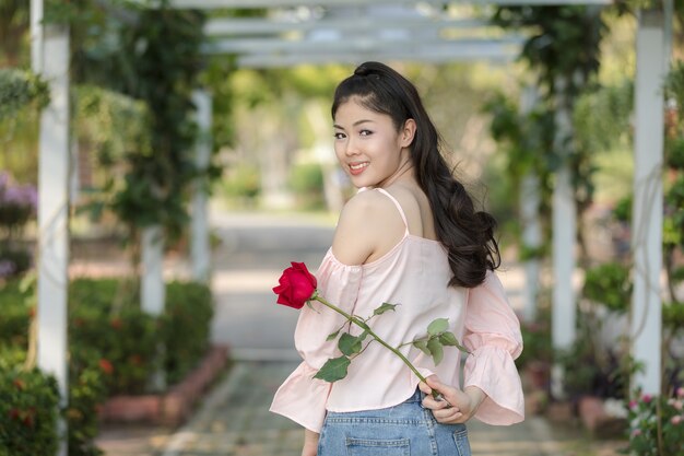 yooung asian girl with rose valentine concept