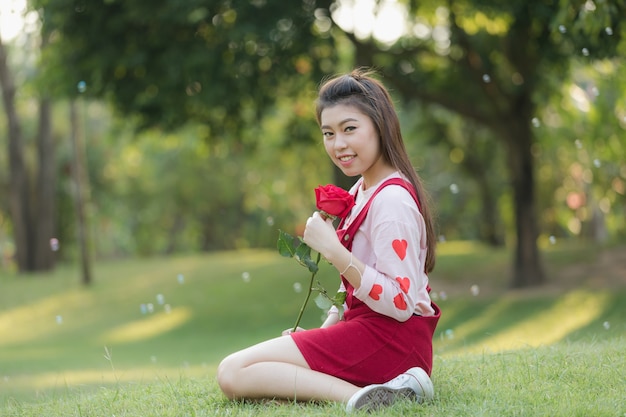 yooung asian girl with rose valentine concept