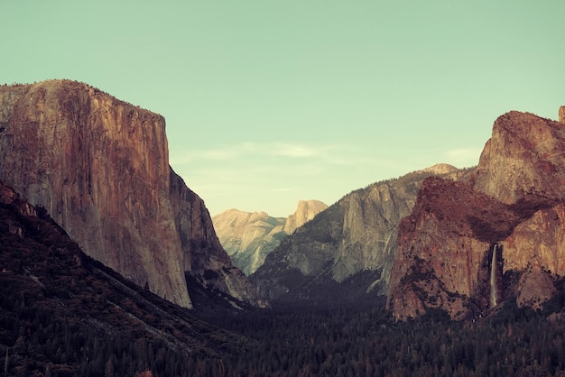 Yosemite Valley at sunset with mountains and waterfalls