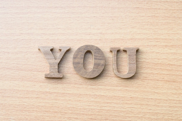 YOU-Alphabet letter from real wood.