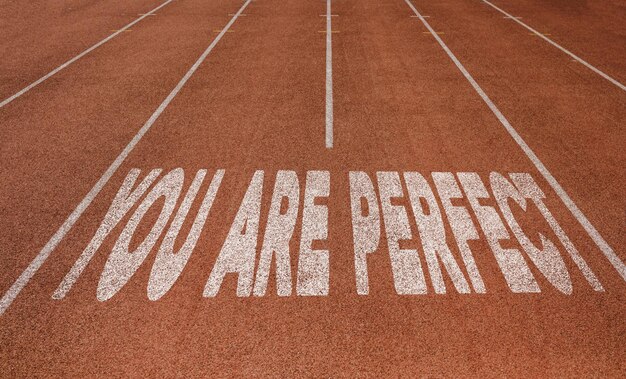 Photo you are perfect written on running track new concept on running track text in white color