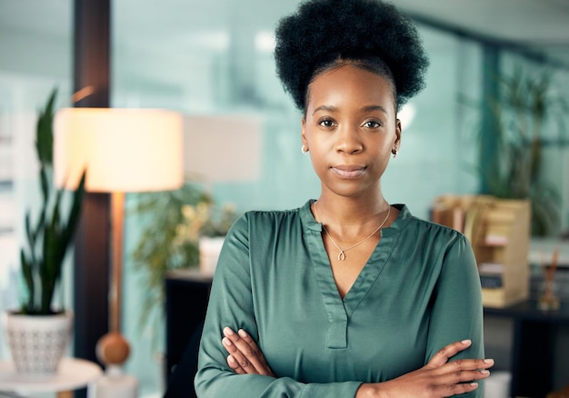 You dont need permission to achieve greatness Portrait of a confident young businesswoman standing in an office