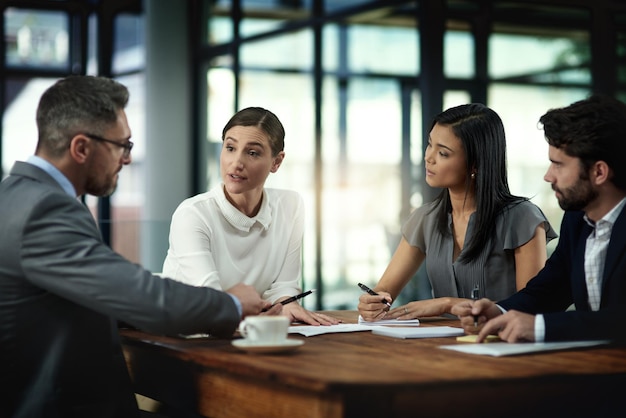 You made an interesting point earlier Shot of a group of businesspeople meeting in the boardroom