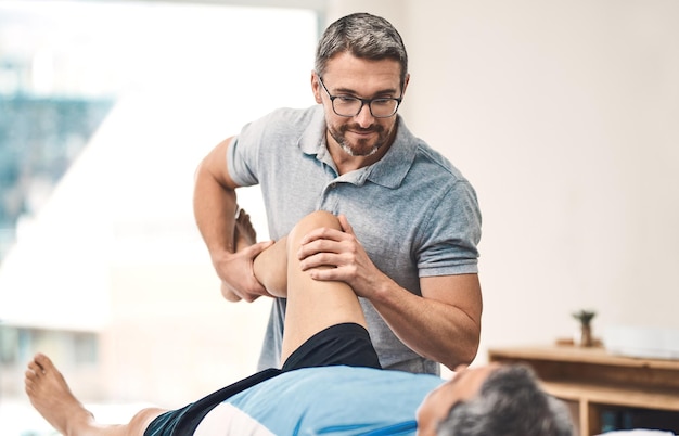 Youll be back to full speed in no time Shot of a senior man going through rehabilitation with his physiotherapist