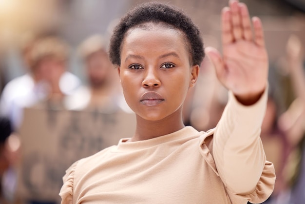 Youll get nothing more from me Shot of a young woman holding her hand up to stop at a protest