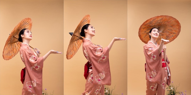 Young 20s Asian Japanese woman wear traditional Kimono hold painting umbrella and hand for rain