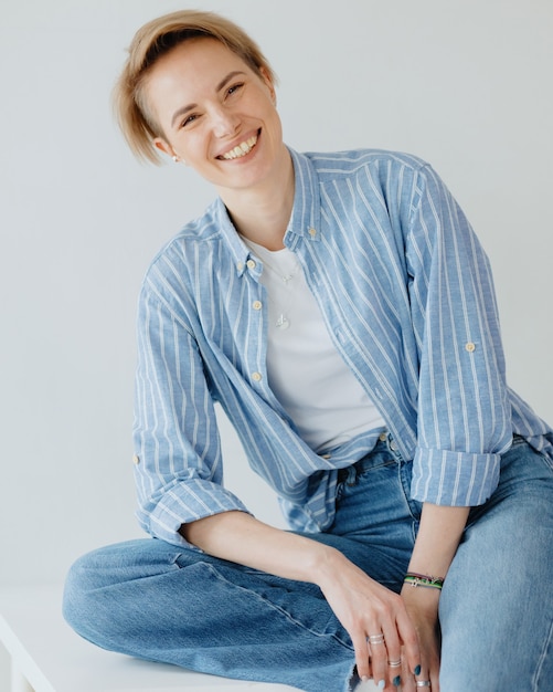 Young adult beautiful european woman model poses portrait of a white woman