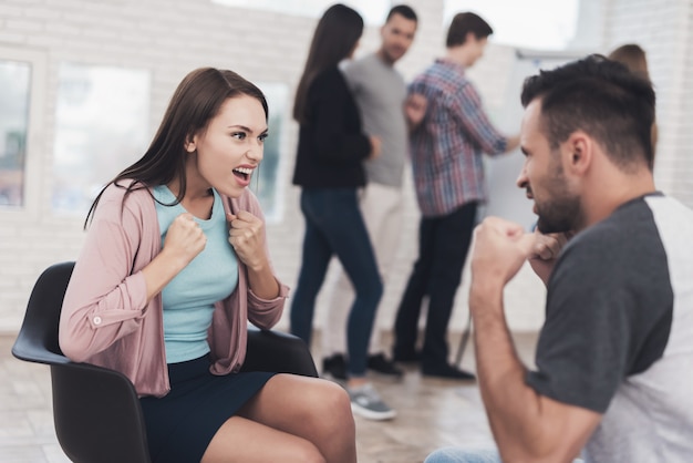 Young adult couple at training anger management