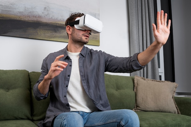 young adult enjoying playing video game