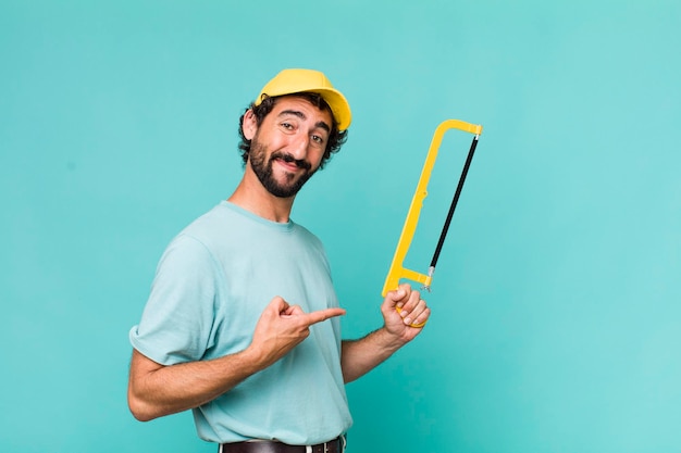 Young adult hispanic crazy man handyman concept