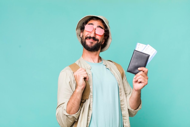 Young adult hispanic crazy man tourist or travel concept