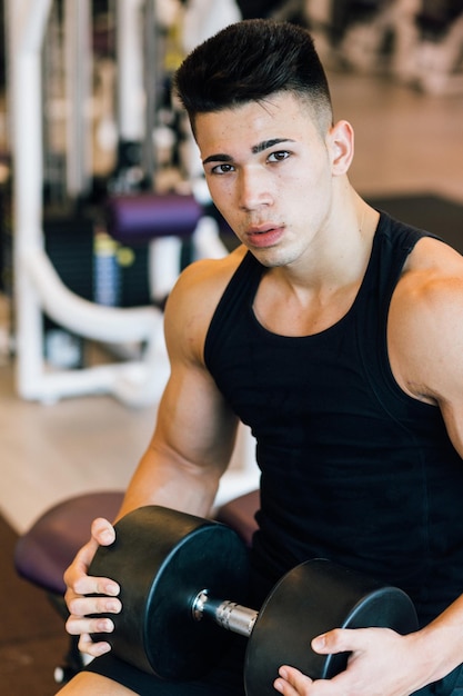 Young adult man working out