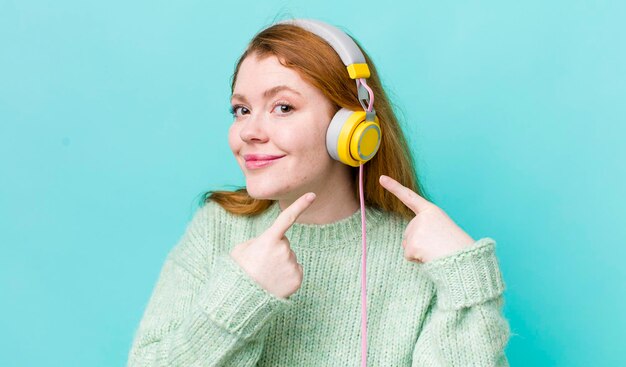 Young adult pretty woman headphones and music concept