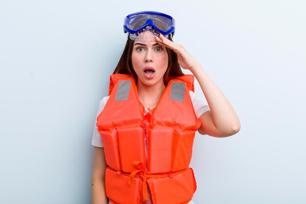 Young adult pretty woman life jacket and summer concept