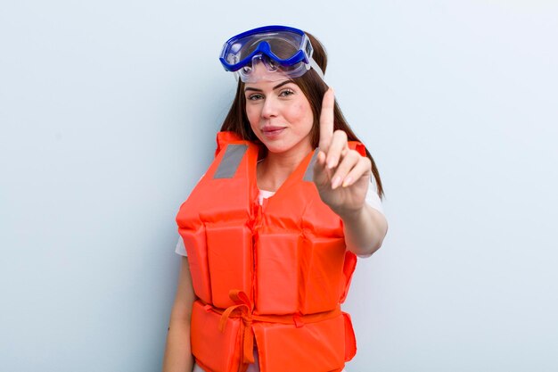 Young adult pretty woman life jacket and summer concept