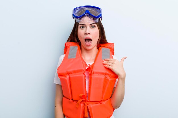 Young adult pretty woman life jacket and summer concept