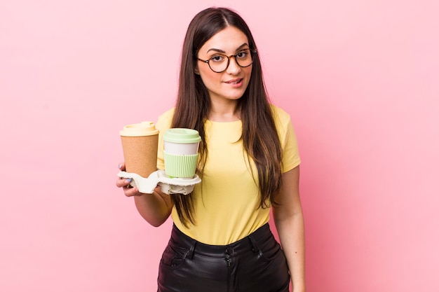 Young adult pretty woman take away coffees concept