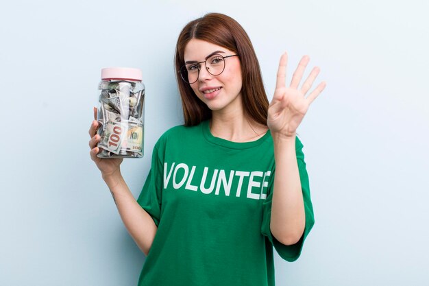 Young adult pretty woman volunteer and donation concept