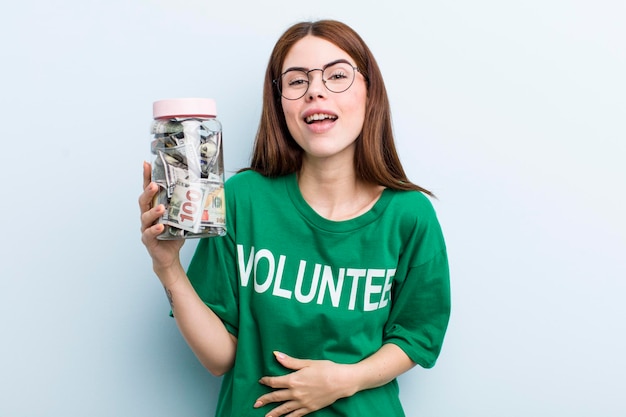 Young adult pretty woman volunteer and donation concept