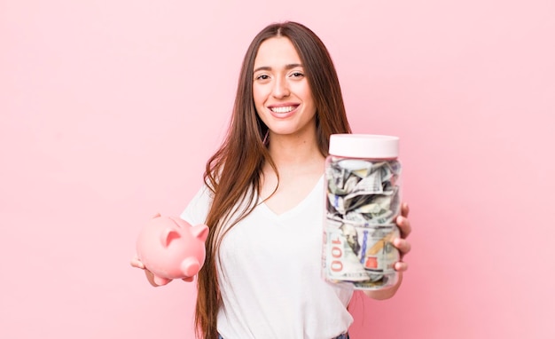 Young adult pretty woman with banknotes savings concept