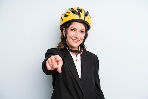 Young adult pretty woman with a bike helmet