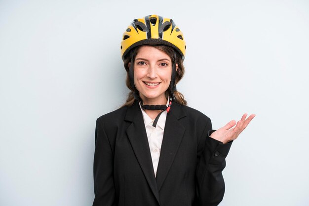 Young adult pretty woman with a bike helmet